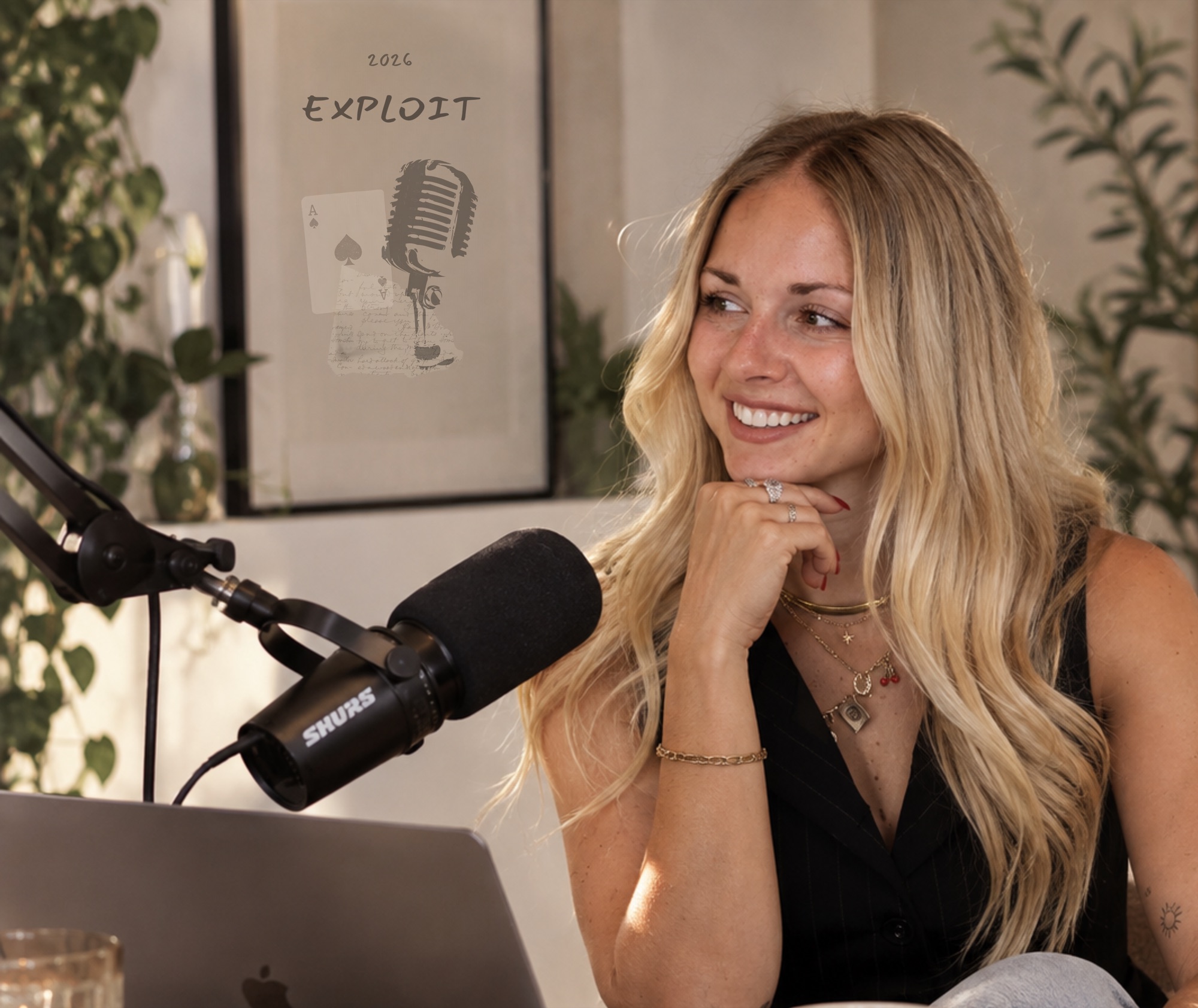 Gabby at a podcast microphone